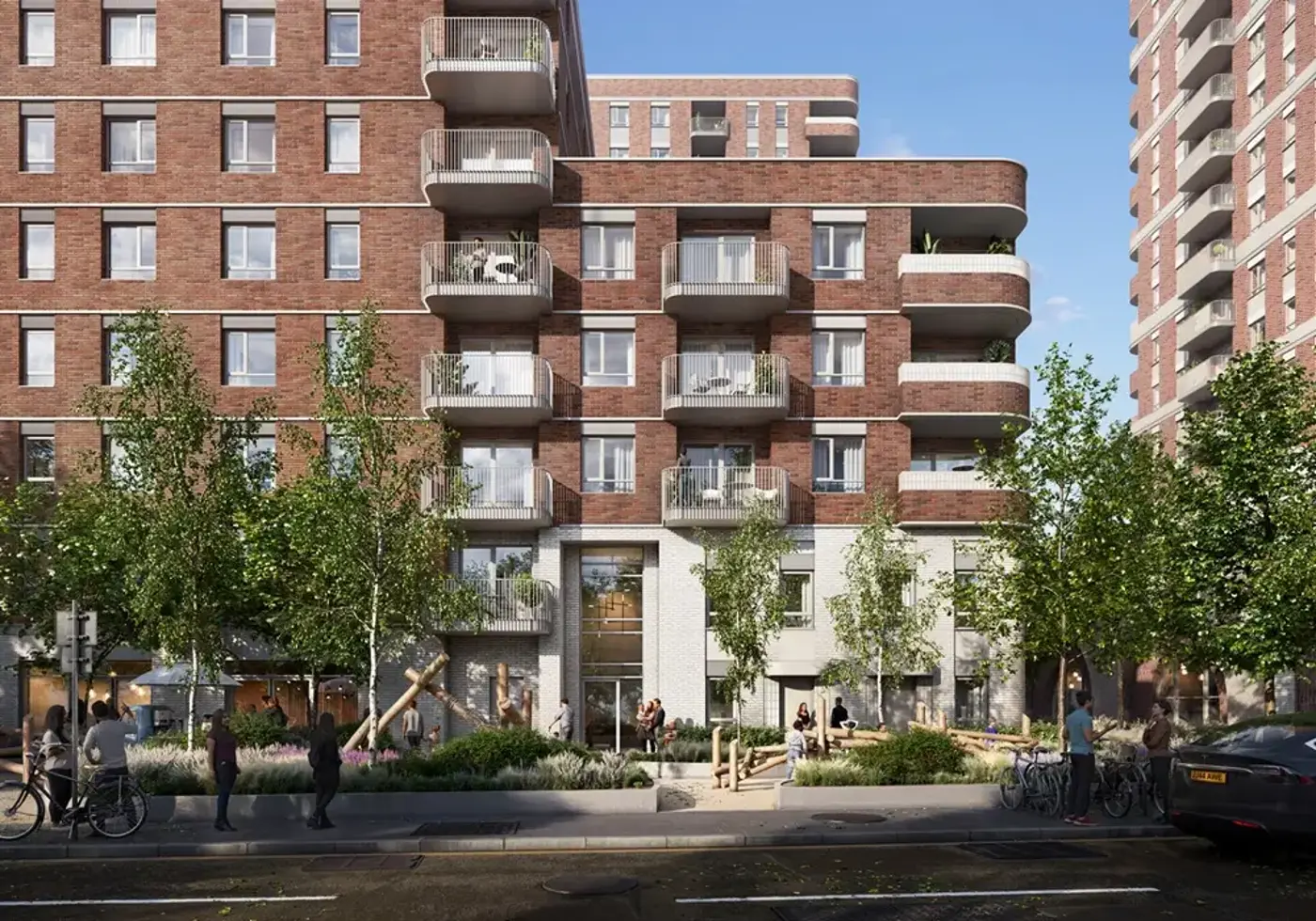 Architect’s view of brick mid-rise homes and a landscaped square at Camden Film Quarter